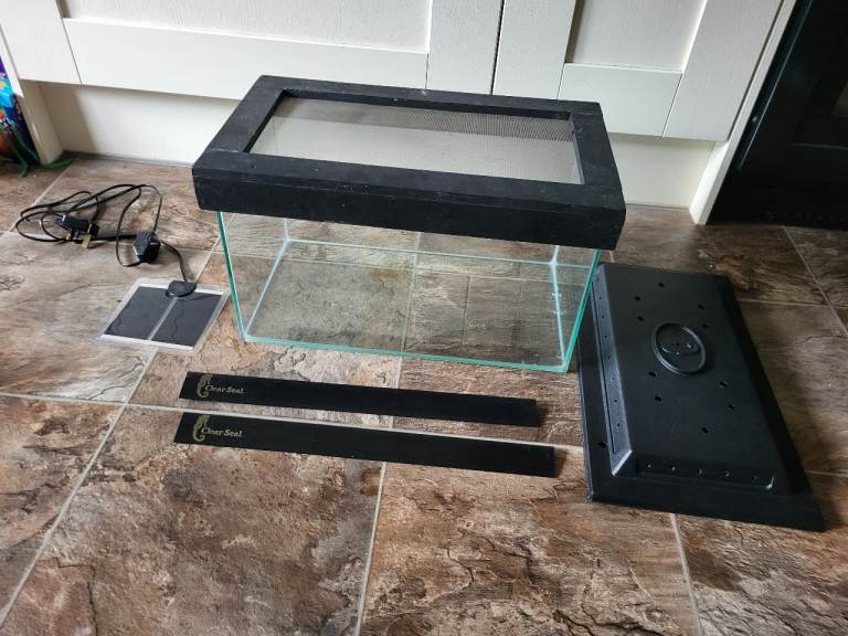 Vivarium tank and Heater Just no longer needed.