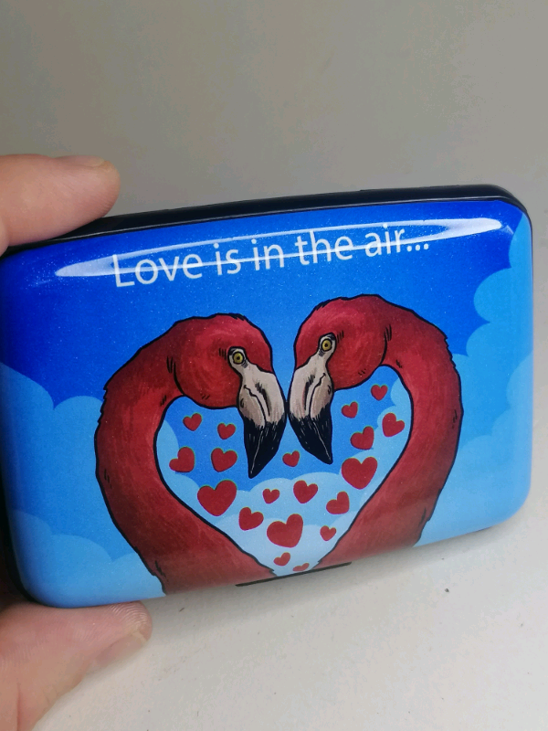 Love in the air,card holder. Brand new. 