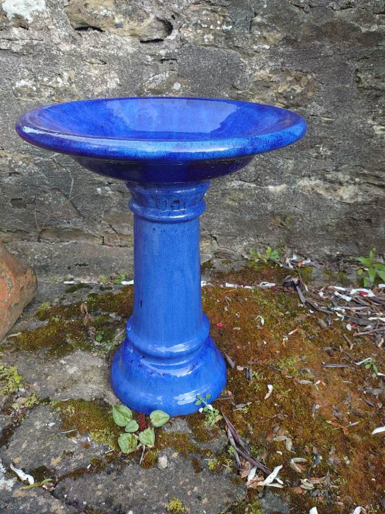 Beautiful blue ceramic bird bath