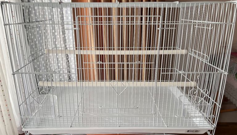 Bird cage for sale. New never used in white