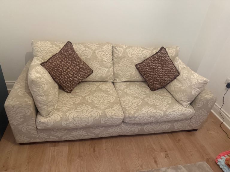 Cream Patterned Two-Seater Sofa - Good Condition