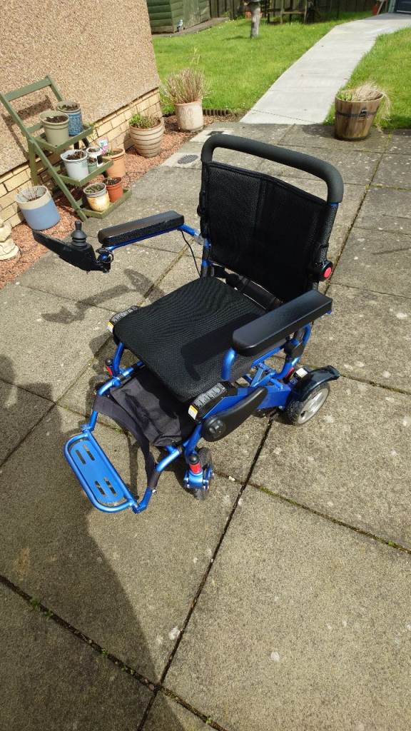 Motion Healthcare Fold-a-lite self-powered electric wheelchair