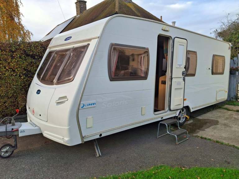  2006/7 Lunar Solaris Four Berth Caravan, Fixed Double Bed with Motor Mover and Awning