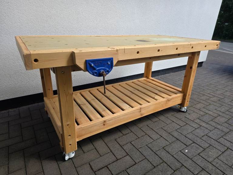 Solid wooden workbench with Holkie height adjustable castor wheels