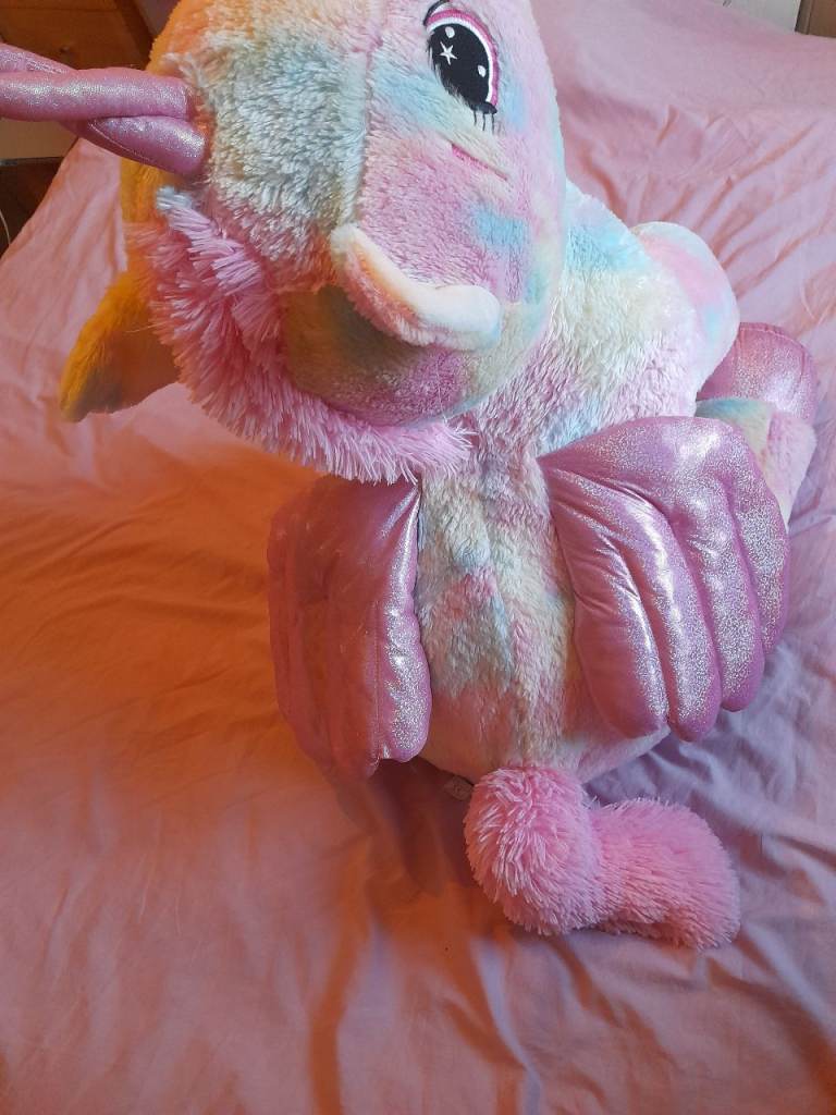 Large pink/pastel coloured stuffed winged Unicorn about 5ft stretched