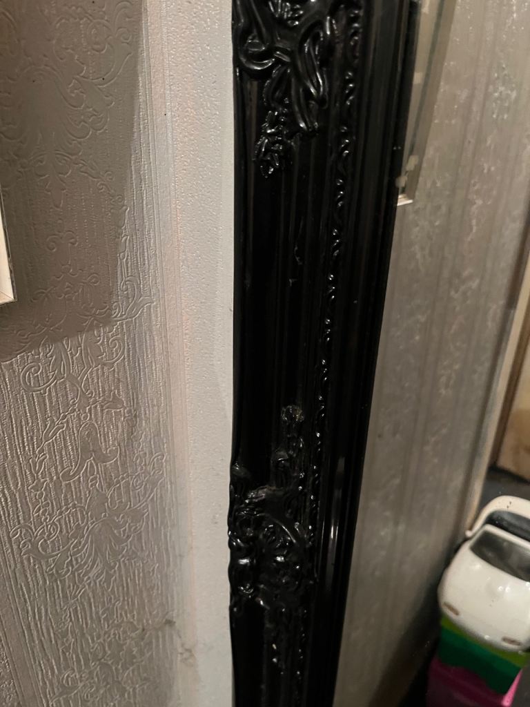 Black rococo style mirror 