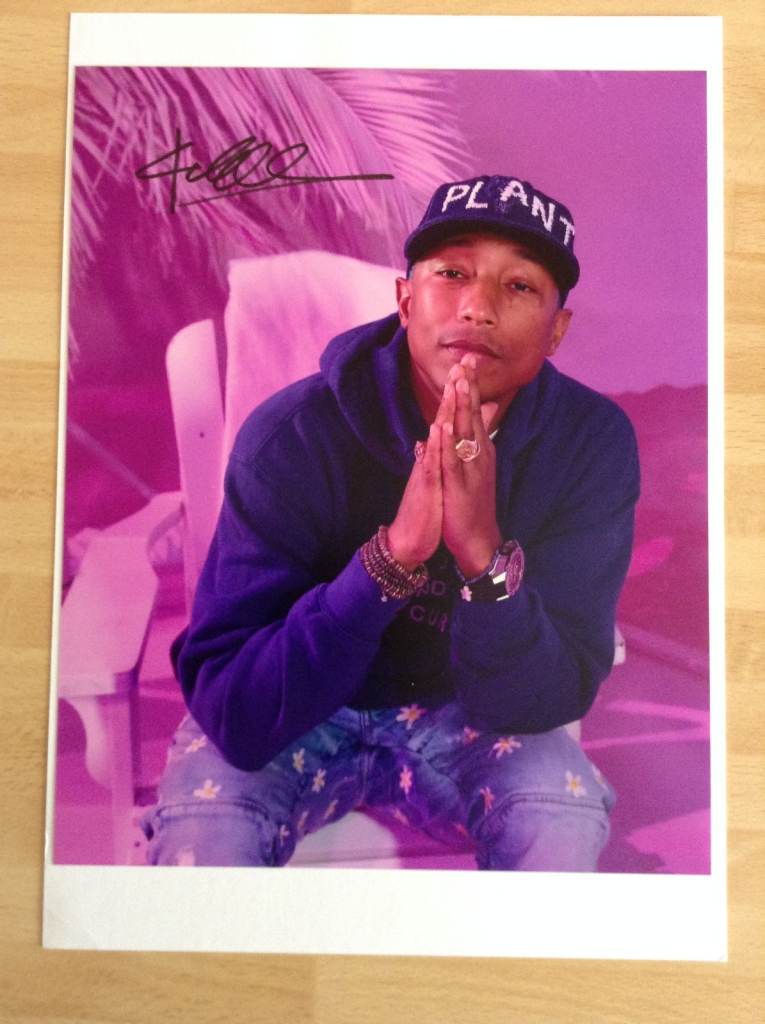 A Signed Photograph of US Singer/Songwriter Pharrell Williams with COA