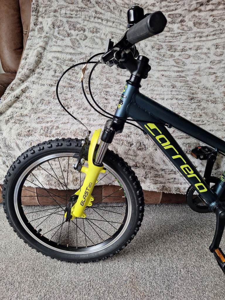 Carrera Blast junior mountain 20 inch wheels 7 speed as new currently £315 in Halfords 