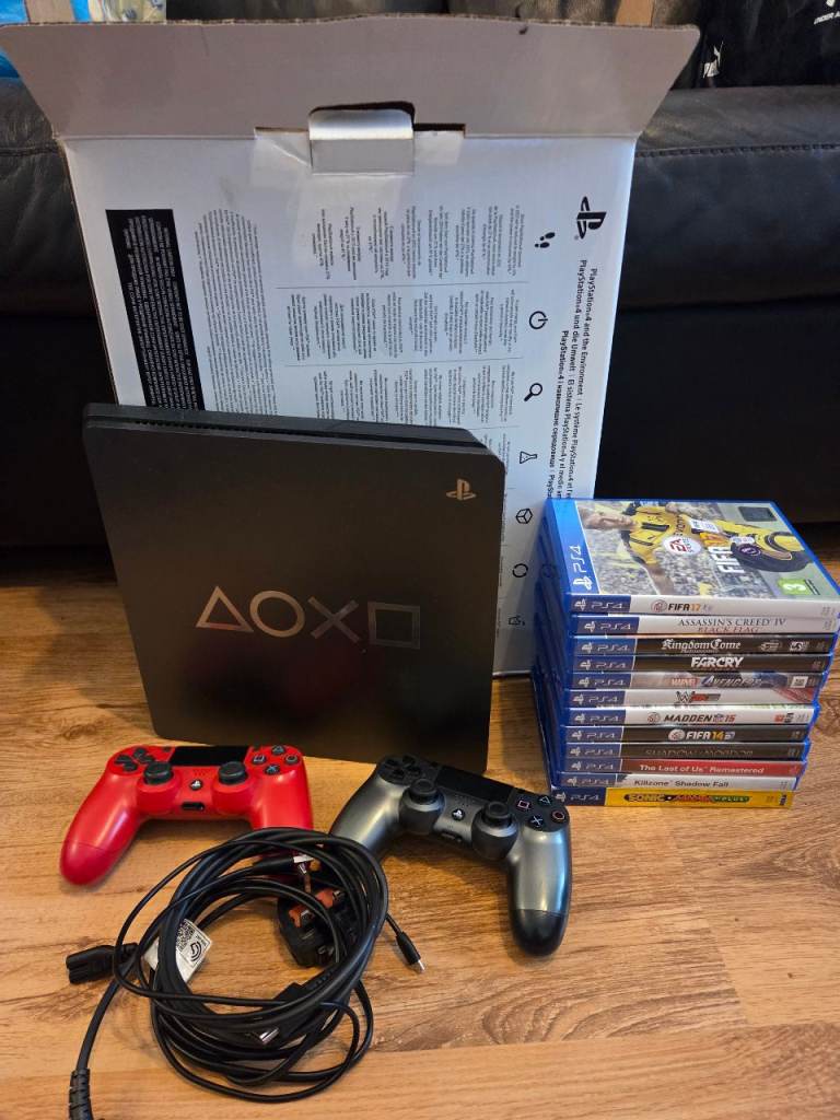 Sony PlayStation 4 Console with Two Controllers and Games