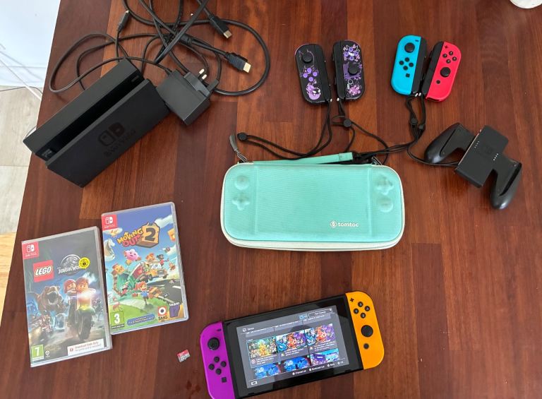Nintendo Switch + extra Joy Cons and games