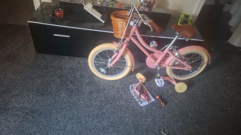 Brand new pink bike with stablesies 