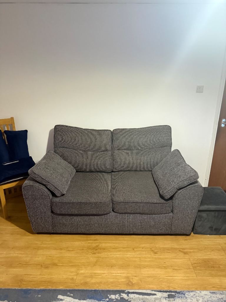 Grey Two-Seater Sofa – Good Condition