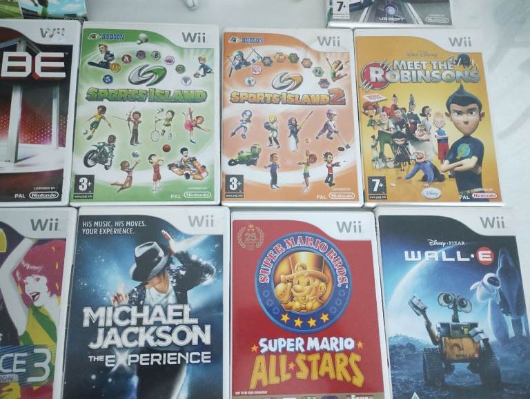 Nintendo Wii Console With Boxed Family Trainer 25 Games And Accessories In Good Condition £100