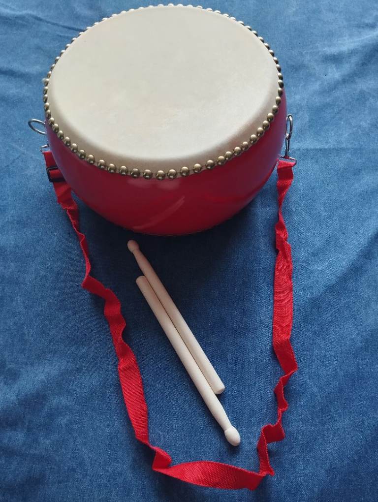 Red Toy Drum with Sticks – Good Condition