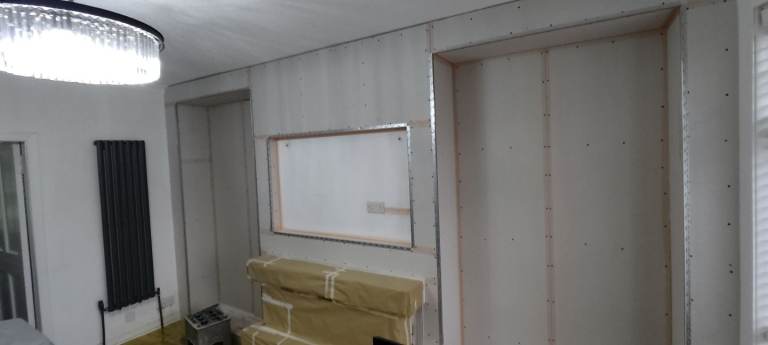 Media walls and other plastering services, water damage repair