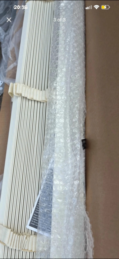 Brand new boxed cream taped Venetian blinds 