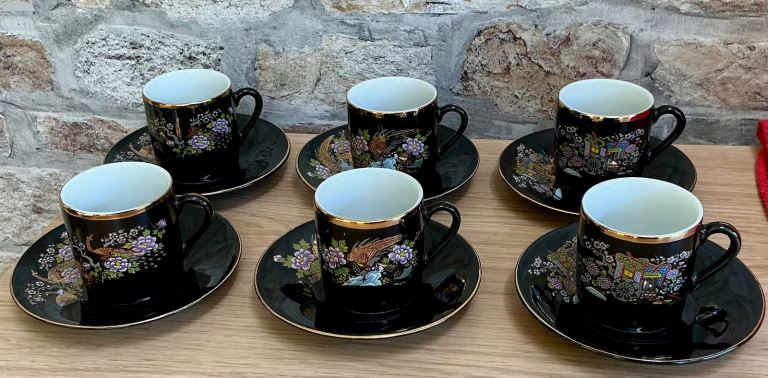 Set vintage, glossy, black lacquered porcelain Japanese cups, saucers, real gold accents and rims