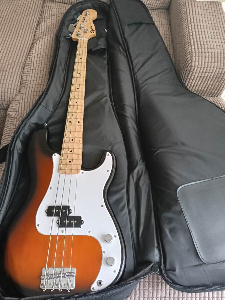 Squier Sonic Bass guitar and Fender Rumble 25 Bass Amplifier 