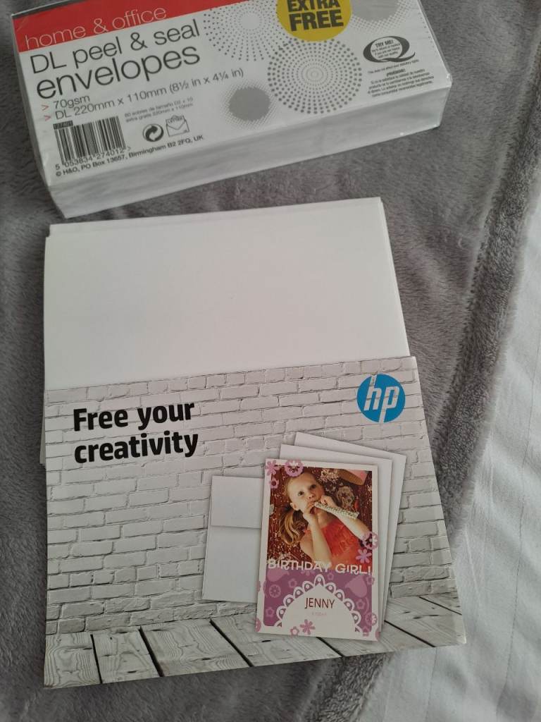 Free, 70white envelopes and 10 5x7inch high gloss hp photo paper plus 4 envelopes 