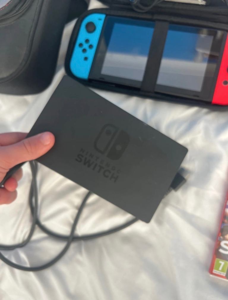 Nintendo switch plus 6 games