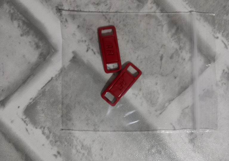 Red Air Force One lace tags 