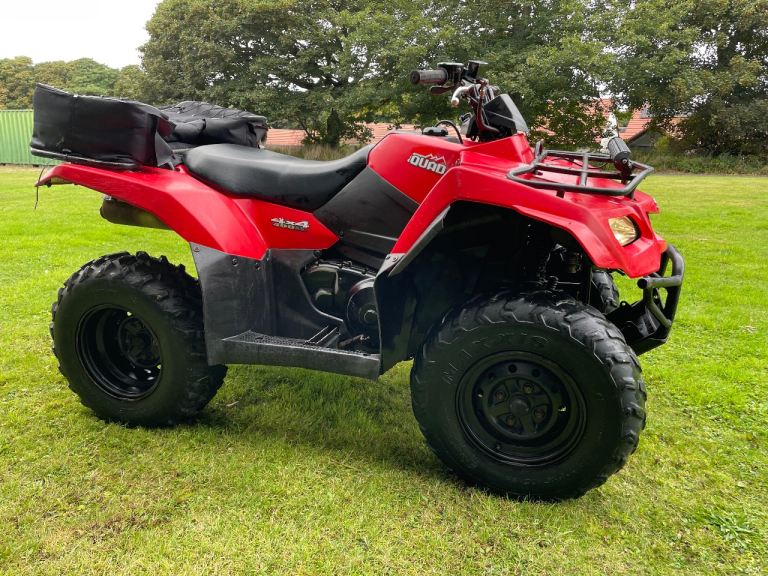 Suzuki kingquad Honda fourtrax, farm quad 