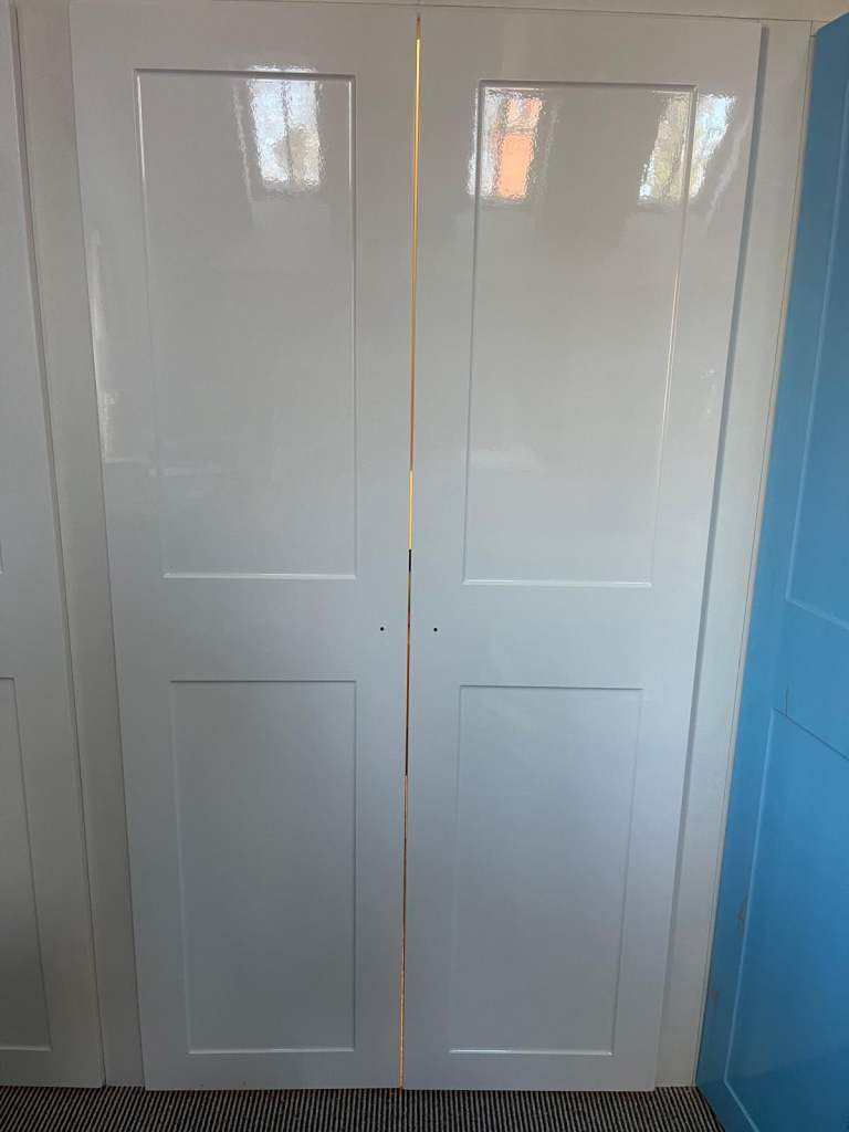 White gloss shaker style wardrobe doors. New