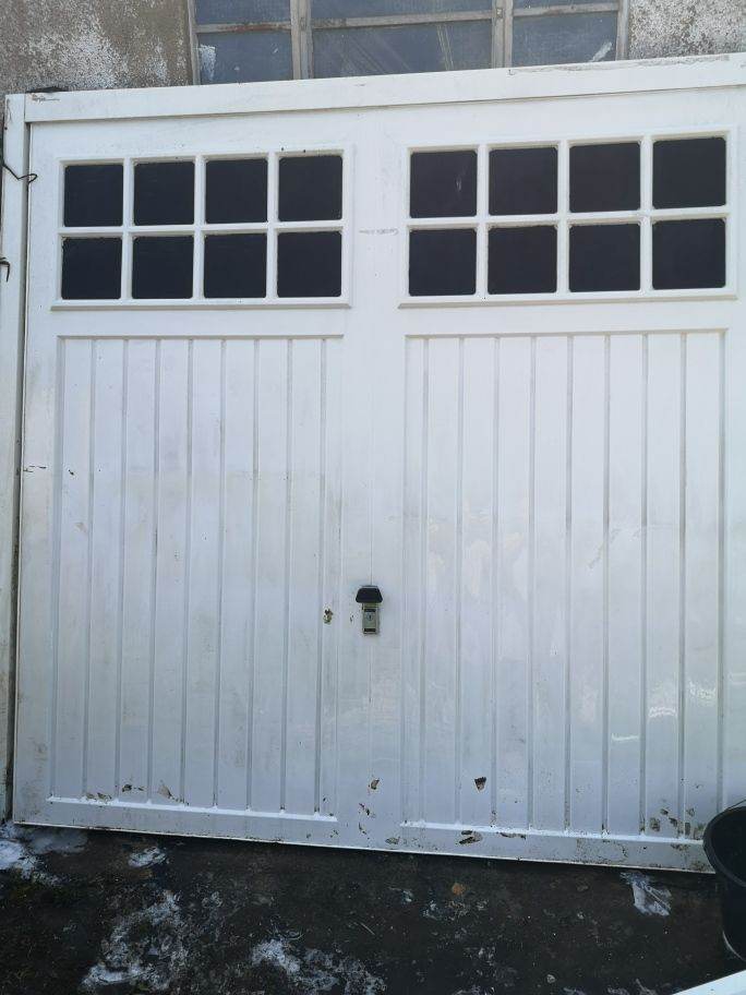White Wooden Garage Doors with Panelled Windows