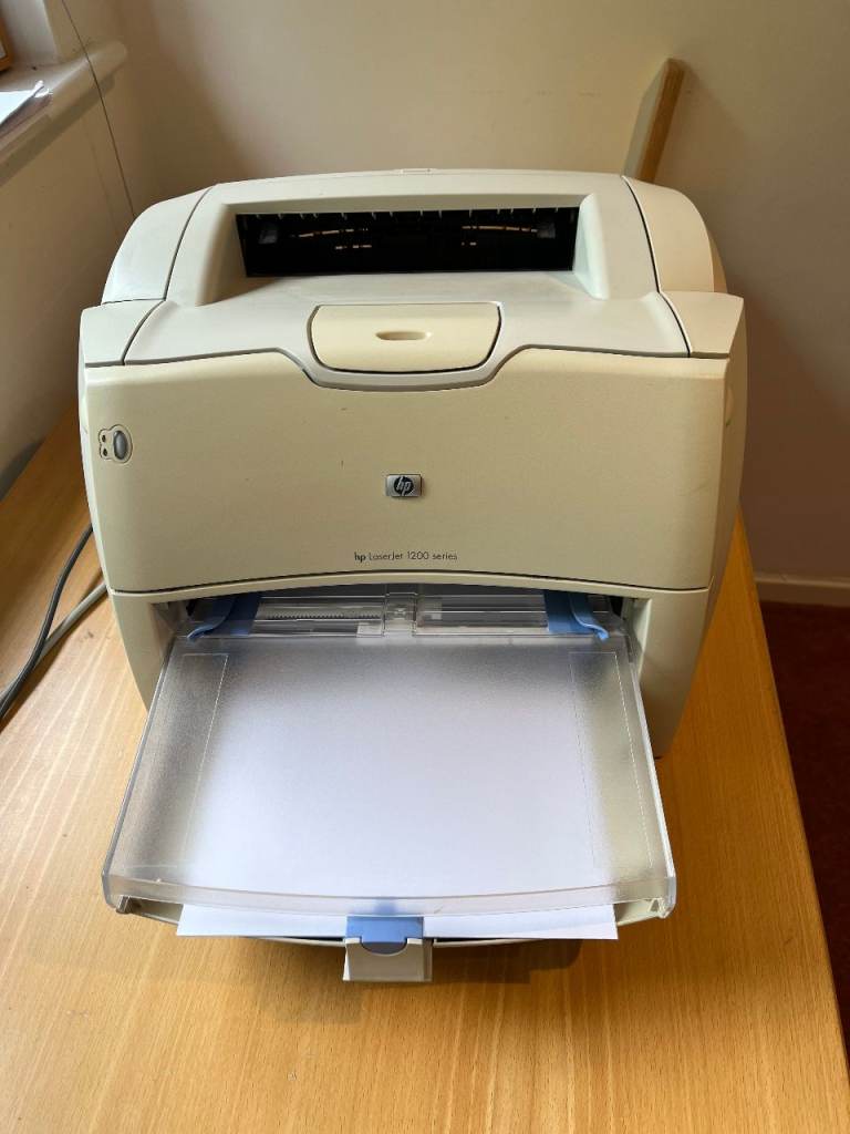 Old but reliable HP Laser Printer + 1 Spare Ink Cartridge