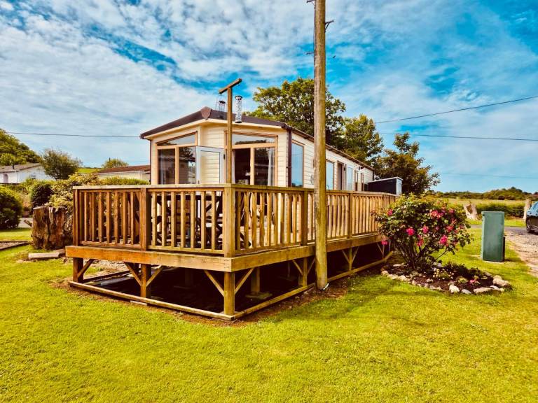 Stunning Abi Supreme Holiday static van with an ensuite toilet and a family shower room