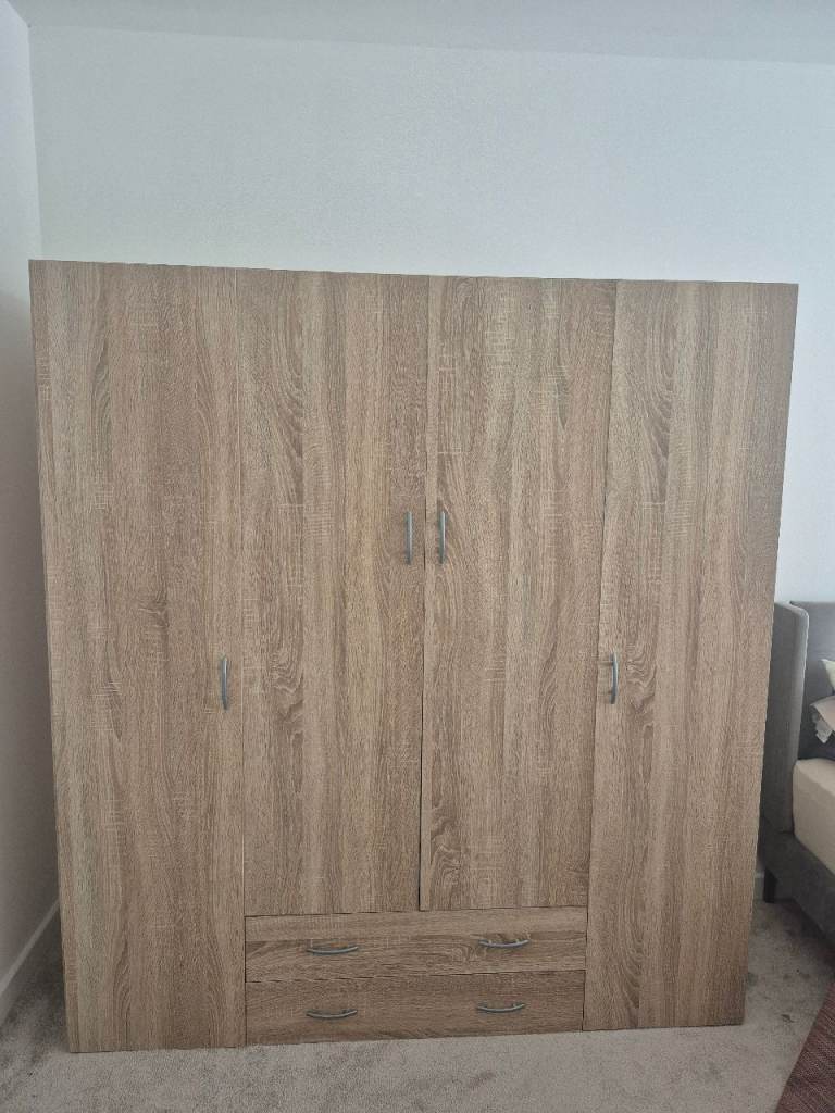 Wardrobe with four doors