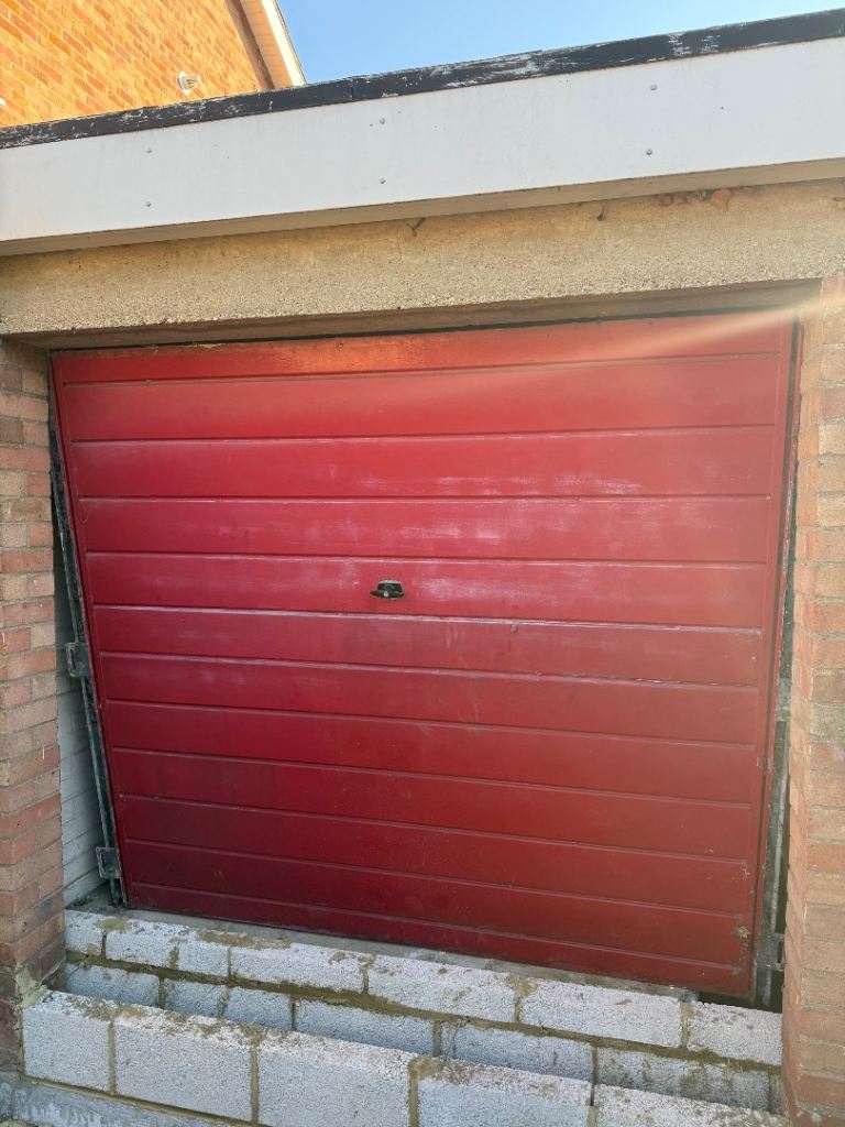 Red Garage door used but in good condition 
