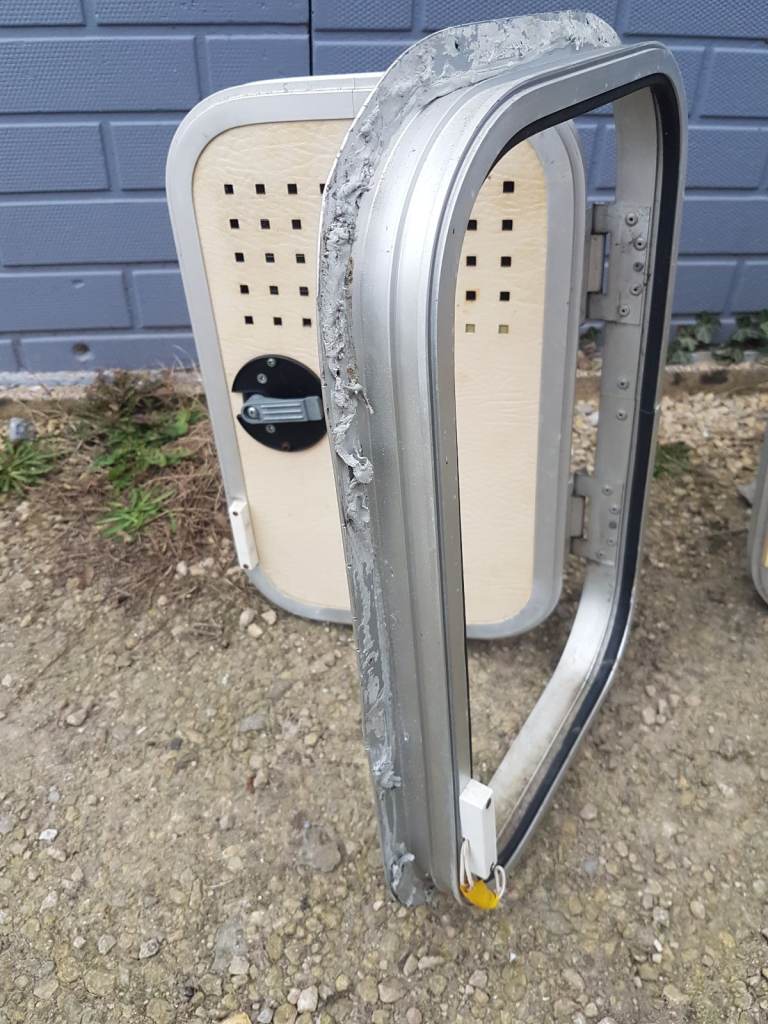 Various side doors with frames and keys for caravan camper motorhome - gas, toilet, storage.