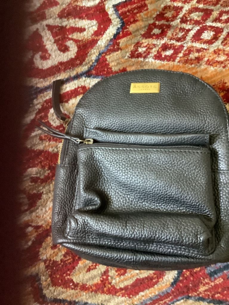 Black leather backpack style bag
