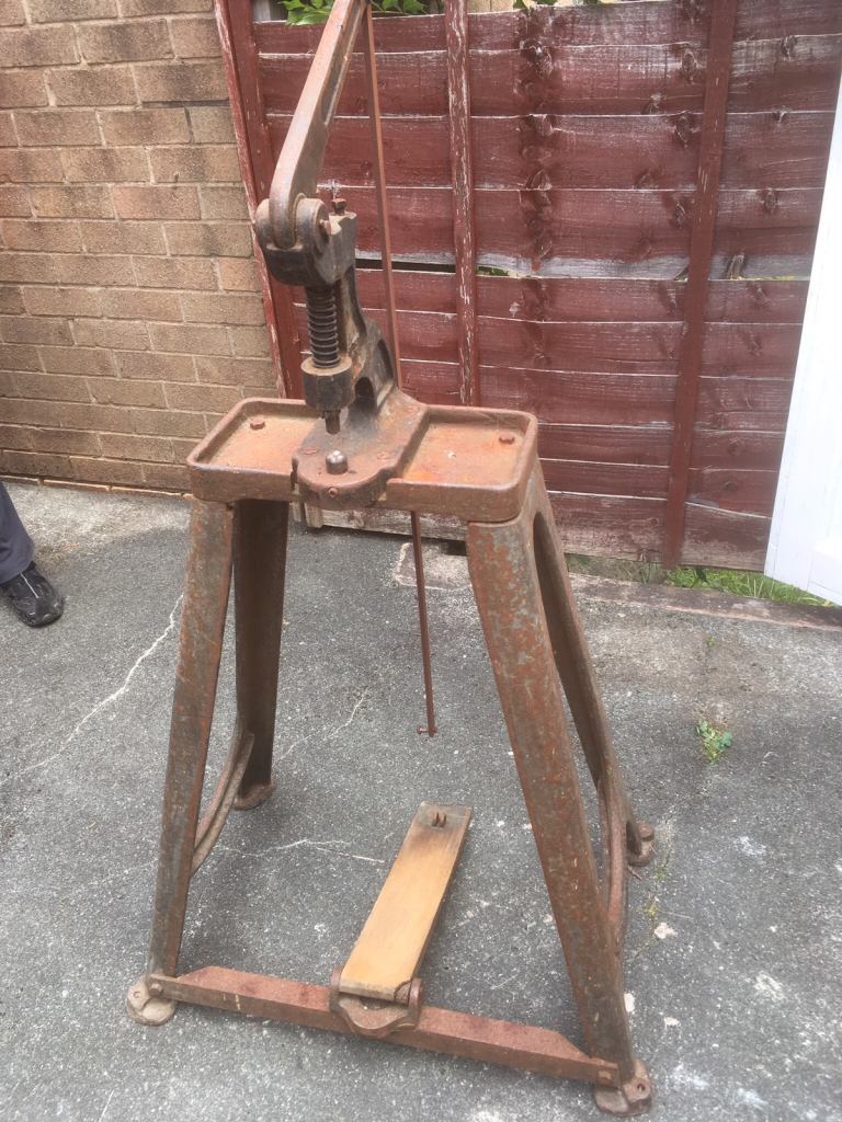 Retro industrial hole punch/outdoor pub table. 