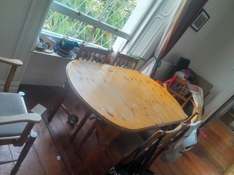Wooden Oval Dining Table – Used Condition