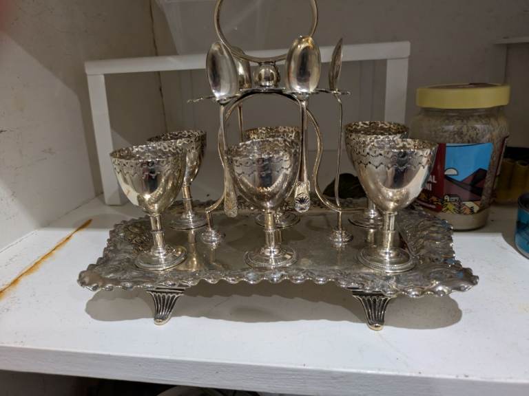 Eggcups spoons and tray