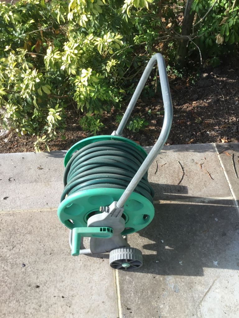 Garden Hose Reel with Hose – Good Condition