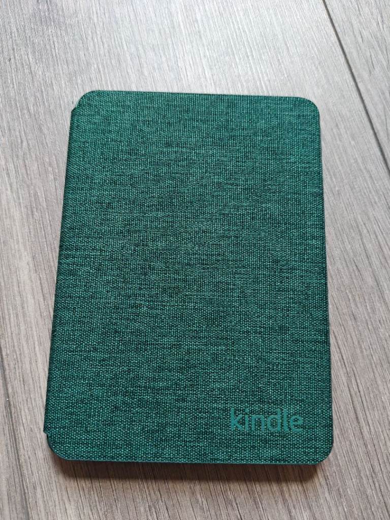 Green fabric covered Kindle cover