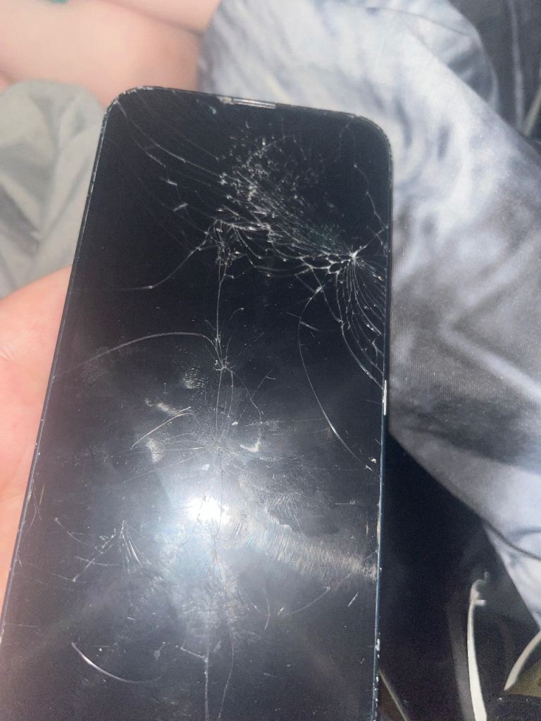 iPhone 13 with Cracked Screen