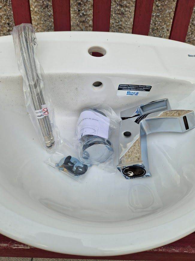 Brand new, sink, waste and tap.