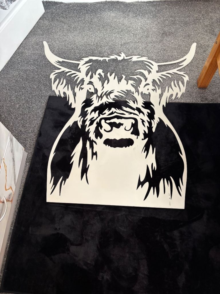 Solid metal frame picture highland cow 