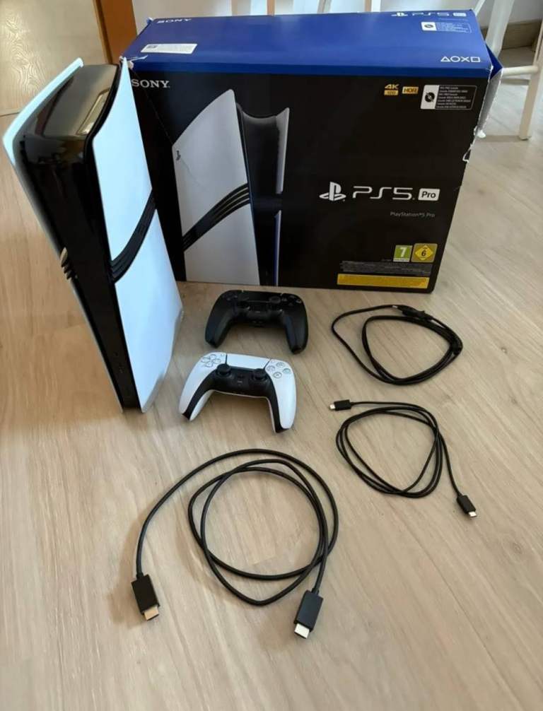 Sony PS5 Pro Console with 2 Controllers and Cables – Good Condition