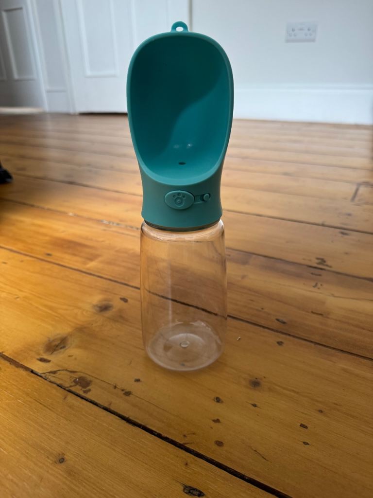 Dog water bottle with bowl attached