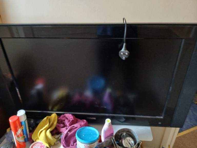 Black Flat Screen TV – Good Condition