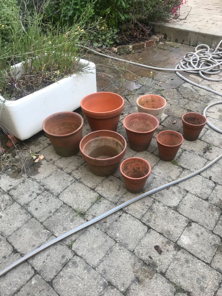 7 x small terracotta garden pots 