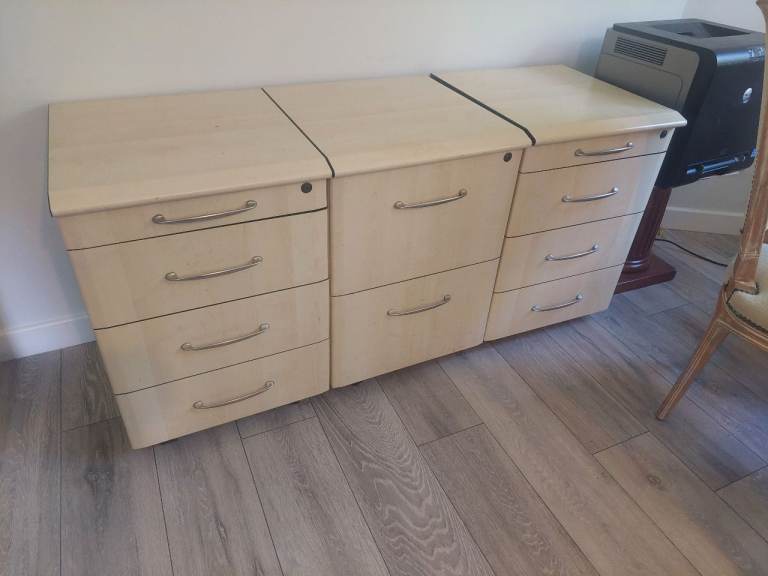 Set of three office storage units on casters