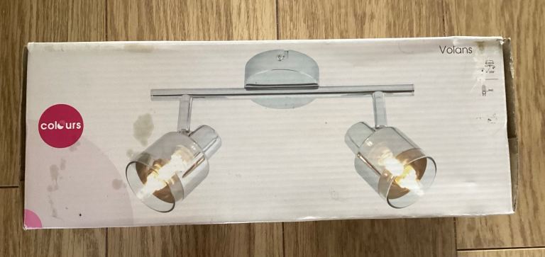 2 adjustable spotlight heads on a straight bar with glass shades, I have 2 £10 each
