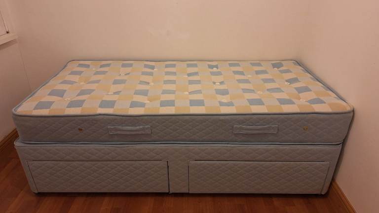 Single bed with mattress and built in drawers, barely used, good condition
