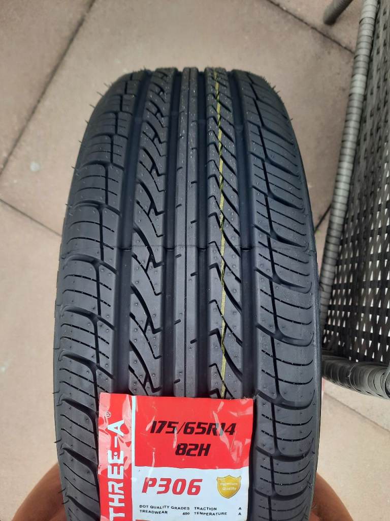 P306 175/65/R14 tyre & wheel plus fittings.